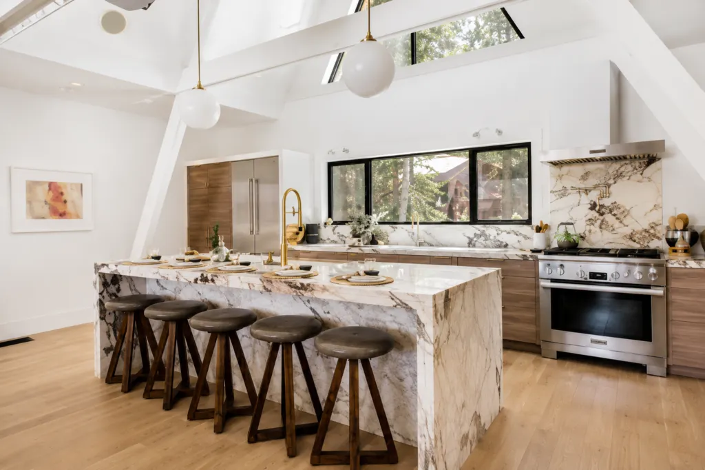 kitchen interior with marble island and contemporary cabinetry