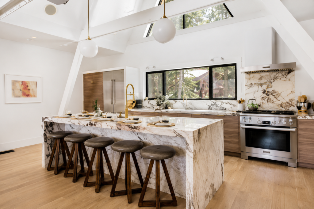 kitchen interior with marble island and contemporary cabinetry