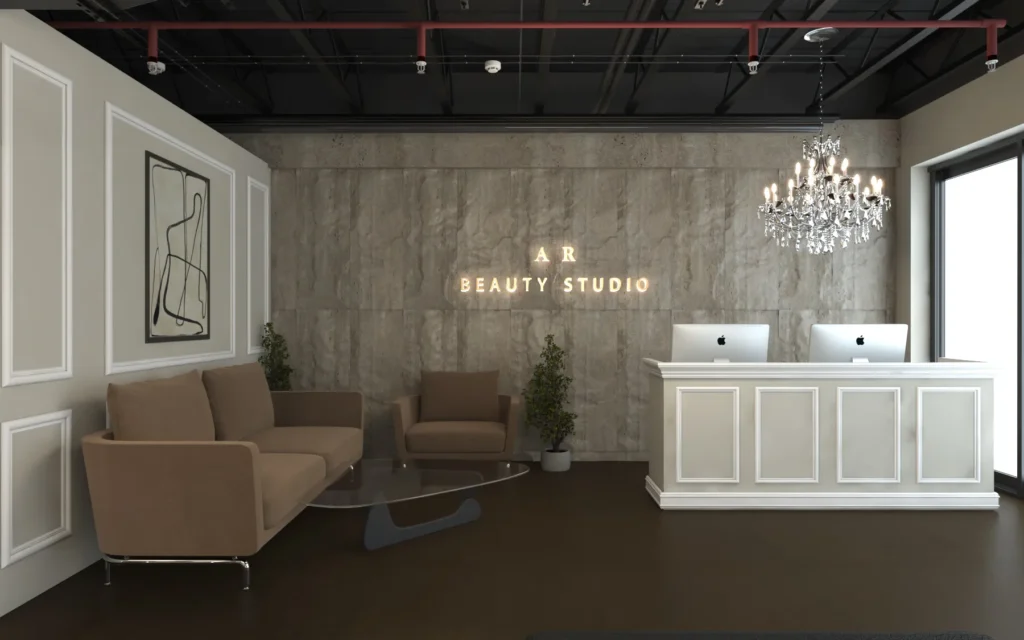 Sophisticated beauty studio reception with chandelier lighting and modern lounge seating.