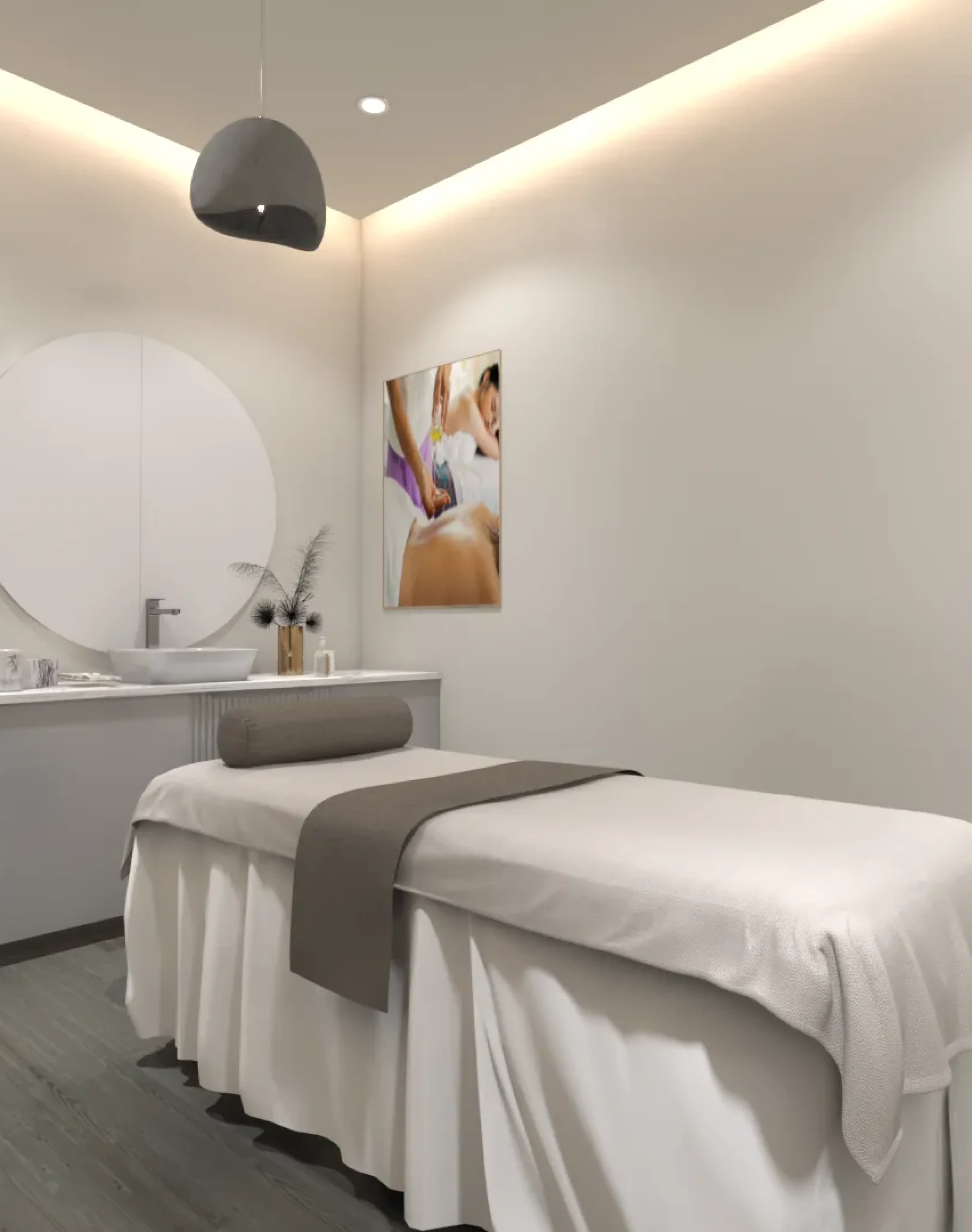 Modern spa treatment room featuring massage bed and soft ambient lighting.