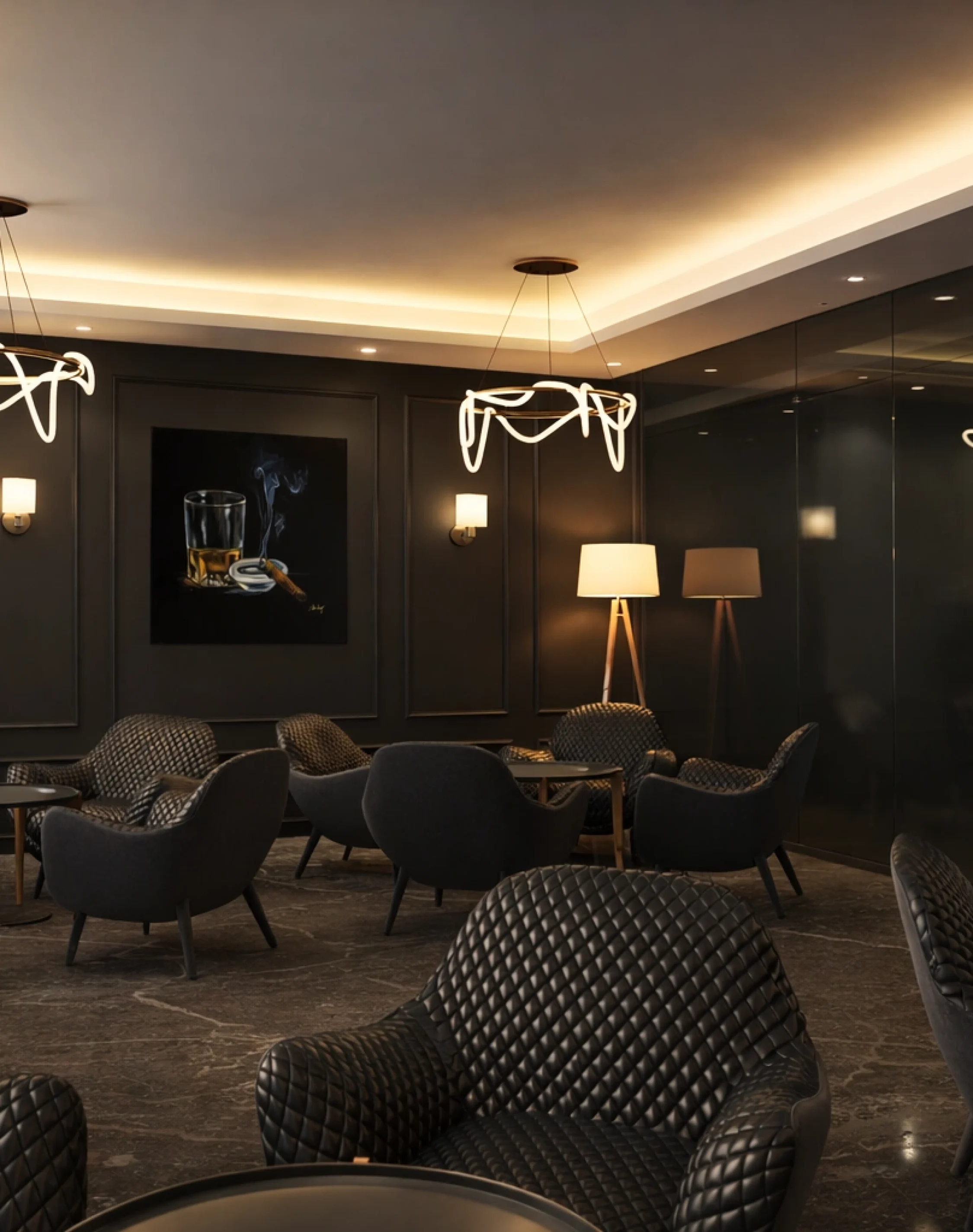 Luxury office lounge with quilted seating, decorative lighting, dark interiors, and elegant commercial space styling.