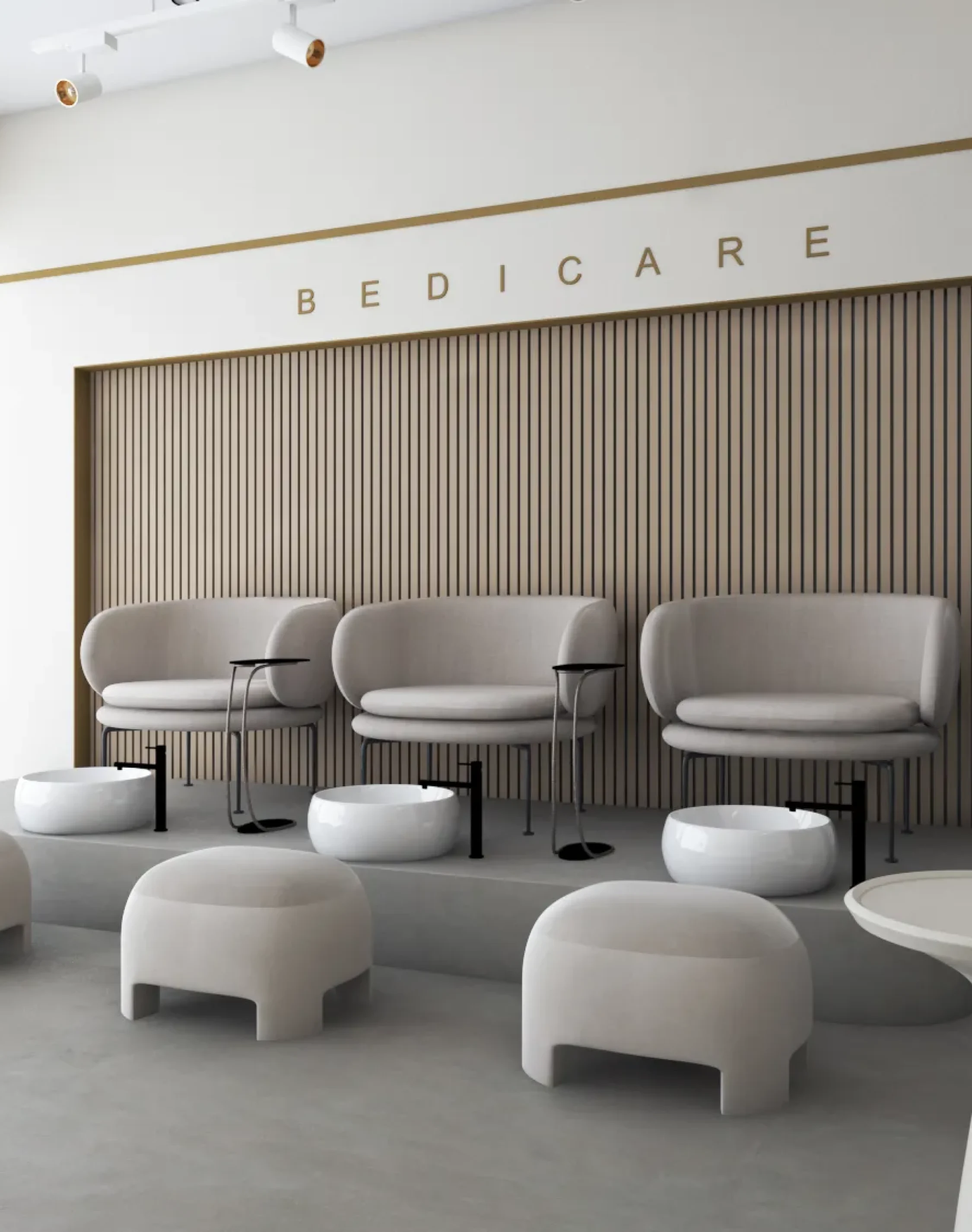 Minimalist pedicure lounge with modern seating and elegant neutral decor.