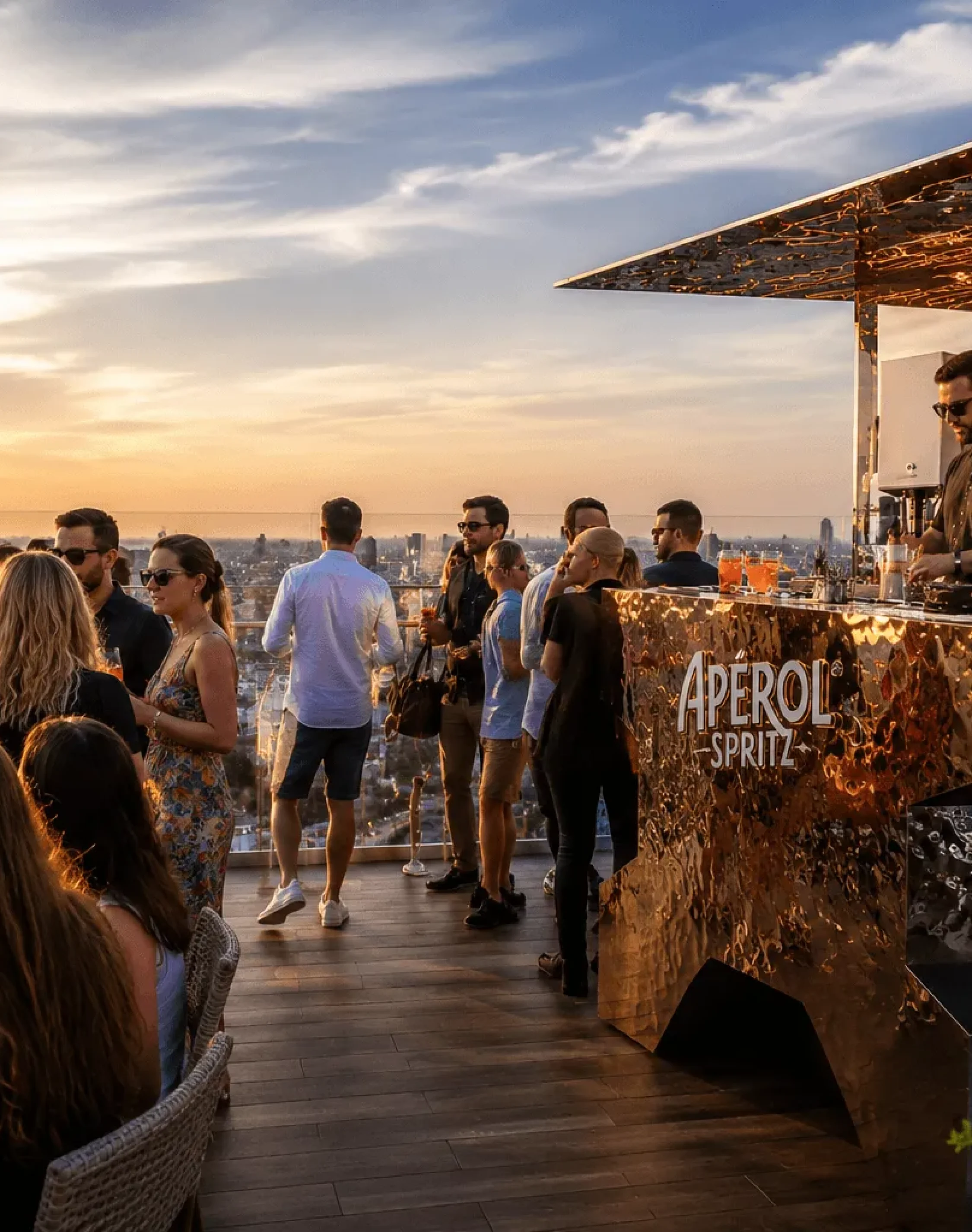 Luxury rooftop lounge design with DJ booth, skyline sunset view, modern entertainment setup, and premium hospitality atmosphere.